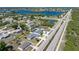 Aerial view of a home in a quiet neighborhood near a body of water at 19468 Edgewater Dr, Port Charlotte, FL 33948