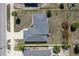 Aerial view of a home featuring a new roof, a yard with minimal landscaping, and a long driveway at 19468 Edgewater Dr, Port Charlotte, FL 33948