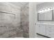 Beautiful bathroom with a tiled walk-in shower, a modern vanity and an updated sink at 19468 Edgewater Dr, Port Charlotte, FL 33948