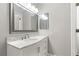 Bathroom vanity features a modern sink, beautiful marble countertops, and updated fixtures at 19468 Edgewater Dr, Port Charlotte, FL 33948