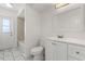 Inviting bathroom with marble floors, shower with tile surround, and updated vanity at 19468 Edgewater Dr, Port Charlotte, FL 33948
