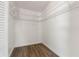Walk-in closet with white wire shelving and laminate flooring at 19468 Edgewater Dr, Port Charlotte, FL 33948