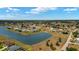 A beautiful aerial view of the community featuring a lake at 2152 Taiwan Ct, Punta Gorda, FL 33983