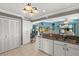Well-lit kitchen showcases ample cabinet space and a view into the open living area at 2152 Taiwan Ct, Punta Gorda, FL 33983