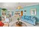 Relaxing living room with dining area, bar, tile floors, and view to backyard at 2152 Taiwan Ct, Punta Gorda, FL 33983