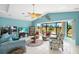 Inviting living room with vaulted ceilings, tile flooring, and large windows at 2152 Taiwan Ct, Punta Gorda, FL 33983