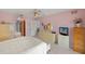 Comfortable main bedroom with neutral tones and ample closet space at 2152 Taiwan Ct, Punta Gorda, FL 33983