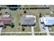 Aerial view of a well maintained home featuring a new roof, nice landscaping and close proximity to neighbors at 2166 Beacon Dr, Port Charlotte, FL 33952