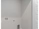 A utilitarian laundry room features outlets and plumbing for a washer and dryer at 223 Australian Dr, Rotonda West, FL 33947