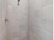 Bathroom shower with tile surround and modern shower head at 223 Australian Dr, Rotonda West, FL 33947