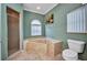 Bathroom featuring a shower and a bathtub at 2300 Carpenter Ln, North Port, FL 34286