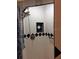 Nicely tiled walk-in shower with a hand-held shower head at 23220 Rountree Ave, Port Charlotte, FL 33980