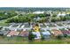Aerial view of a community street highlighting the home's location and the layout of the neighborhood at 2442 Rio De Janeiro Ave, Punta Gorda, FL 33983