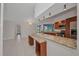 Spacious kitchen with a large island, granite countertops, and stainless steel appliances at 2442 Rio De Janeiro Ave, Punta Gorda, FL 33983