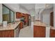 Well-equipped kitchen featuring stainless steel appliances and tile flooring at 2442 Rio De Janeiro Ave, Punta Gorda, FL 33983
