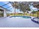 Pool with screen enclosure offers relaxing outdoor living at 2442 Rio De Janeiro Ave, Punta Gorda, FL 33983