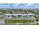 Sunrise Towers exterior view showcasing the canal and balconies perfect for enjoying the outdoor scenery at 2486 Caring Way # 14A, Port Charlotte, FL 33952