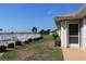 Property with a well-manicured lawn and colorful landscaping, providing a serene outdoor setting at 26333 Nadir Rd # 111, Punta Gorda, FL 33983