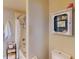 Bathroom with a shower/tub, toilet, and cabinet; complete with towels and decorative elements at 26333 Nadir Rd # 111, Punta Gorda, FL 33983