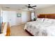 Comfortable bedroom with neutral walls, carpet flooring, and a king-size bed at 26333 Nadir Rd # 111, Punta Gorda, FL 33983