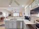 Beautiful kitchen showcasing stainless steel appliances and an open layout connected to the living area at 26333 Nadir Rd # 111, Punta Gorda, FL 33983