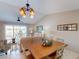 Bright living room featuring contemporary furnishings, stylish decor, and a sliding door to the outdoor patio at 26333 Nadir Rd # 111, Punta Gorda, FL 33983