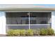 Enclosed patio, offering additional living space with a view of outdoor greenery at 26333 Nadir Rd # 111, Punta Gorda, FL 33983