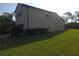 The exterior of the home features a well-manicured lawn and garden, highlighting the property's natural beauty at 2739 Sherman Oak Dr, North Port, FL 34289