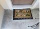 Charming 'Home Sweet Home' welcome mat placed in front of the entryway at 2739 Sherman Oak Dr, North Port, FL 34289