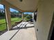 A screened lanai is shown with a hammock, shade and outdoor seating at 2739 Sherman Oak Dr, North Port, FL 34289
