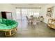 Dining room featuring wood floors and a large papasan chair at 3122 Scranton St, Port Charlotte, FL 33952