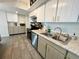 Kitchen featuring stainless appliances, granite countertops, and ample cabinet space at 3122 Scranton St, Port Charlotte, FL 33952