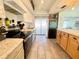 Kitchen featuring stainless steel appliances, granite countertops, and wood cabinets at 3122 Scranton St, Port Charlotte, FL 33952