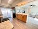 Open kitchen view, displaying stainless steel appliances and access to the adjacent living room at 3122 Scranton St, Port Charlotte, FL 33952