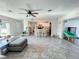 Spacious open-concept living room and kitchen with tile flooring and ample natural light at 3122 Scranton St, Port Charlotte, FL 33952