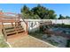 Backyard pool area featuring a deck, stairs, flowers, and outdoor seating, perfect for relaxation at 3122 Scranton St, Port Charlotte, FL 33952