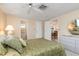 Inviting bedroom showing closet and bathroom entrances at 315 Holly Rd, Venice, FL 34293
