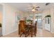 Dining room featuring tile floors and an adjacent sliding glass door at 315 Holly Rd, Venice, FL 34293