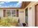 Entrance to home with view of front door and adjacent window at 315 Holly Rd, Venice, FL 34293