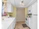 Bright kitchen featuring neutral walls and tiled floors at 315 Holly Rd, Venice, FL 34293