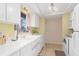 Bright kitchen featuring neutral walls and tiled floors at 315 Holly Rd, Venice, FL 34293