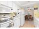 Bright kitchen that leads into dining room at 315 Holly Rd, Venice, FL 34293