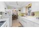 Bright kitchen that leads into dining room at 315 Holly Rd, Venice, FL 34293
