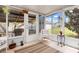 Enclosed patio with tiled floor and view of the backyard at 315 Holly Rd, Venice, FL 34293