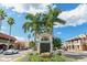 A street view featuring the Venice sign, surrounded by palm trees and charming storefronts at 315 Holly Rd, Venice, FL 34293