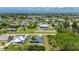 Enjoy views of the community including the fenced yard and gorgeous neighboring homes at 3302 Palm Dr, Punta Gorda, FL 33950