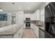 Bright kitchen offers stainless steel appliances, ample cabinet space, and an island at 3302 Palm Dr, Punta Gorda, FL 33950