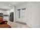 View into modern kitchen featuring stainless appliances and access to the living area at 3302 Palm Dr, Punta Gorda, FL 33950