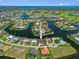 An aerial view of a waterfront community showcases the luxury homes with access to deep water at 3353 Sandpiper Dr, Punta Gorda, FL 33950
