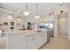 Open kitchen features stainless steel appliances, a large island, and an open concept design at 3353 Sandpiper Dr, Punta Gorda, FL 33950
